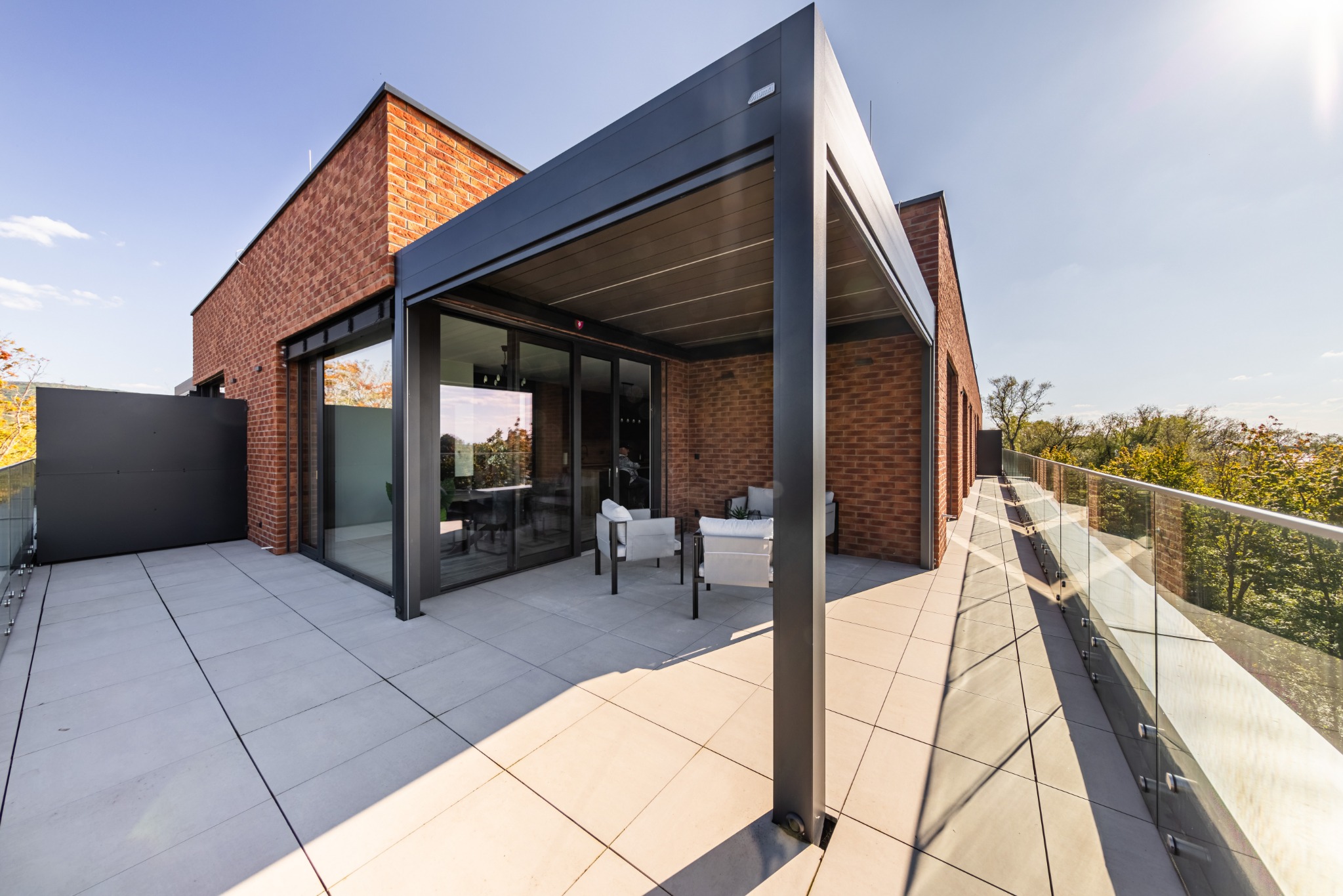 Rooftop terrace and glass doors at The Riverview 3BR Luxury Residence Piešťany